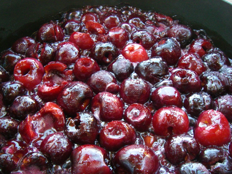 Bubbling caramelizing cherries